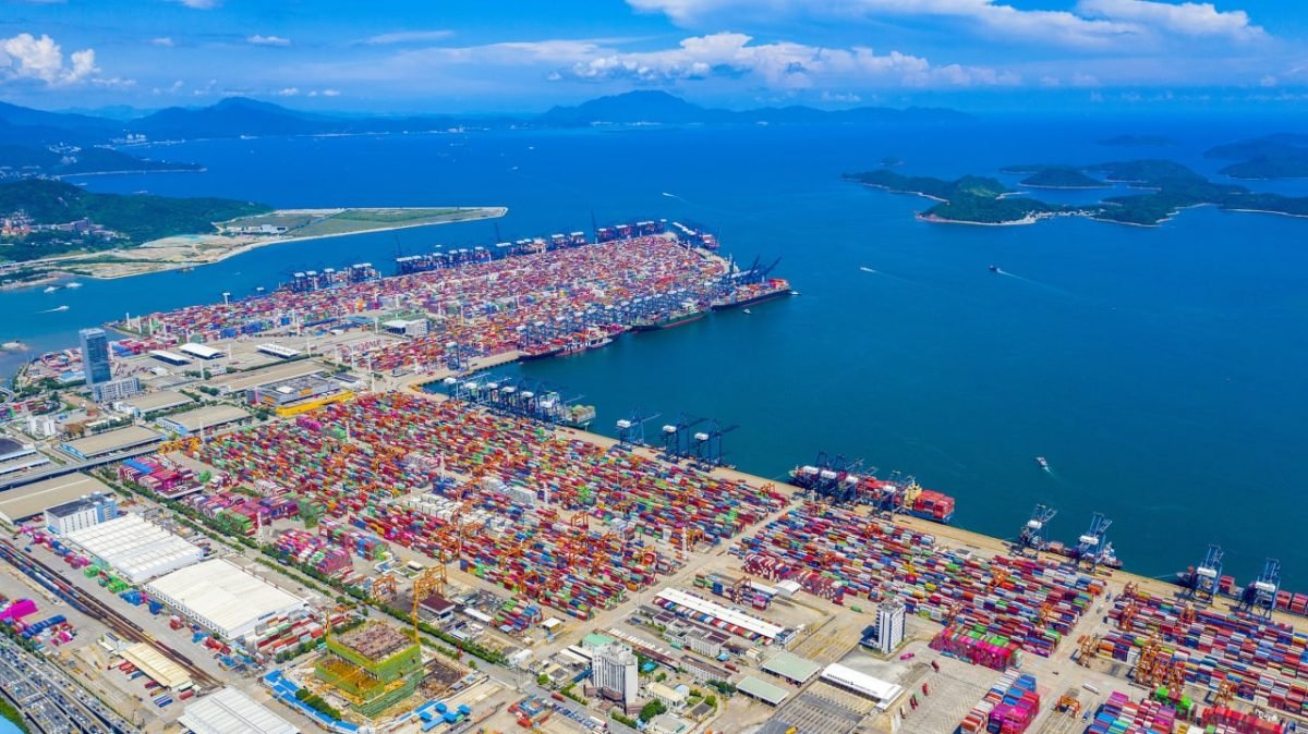 Large Asian container terminal showing concentrated port infrastructure and industrial capacity