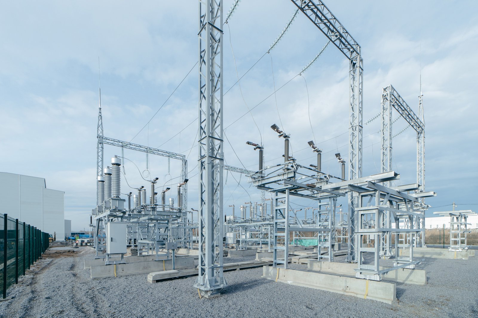 Large electrical substation containing transformers, transmission equipment and high-voltage infrastructure.